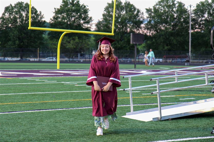 Graduates wearing maroon robes